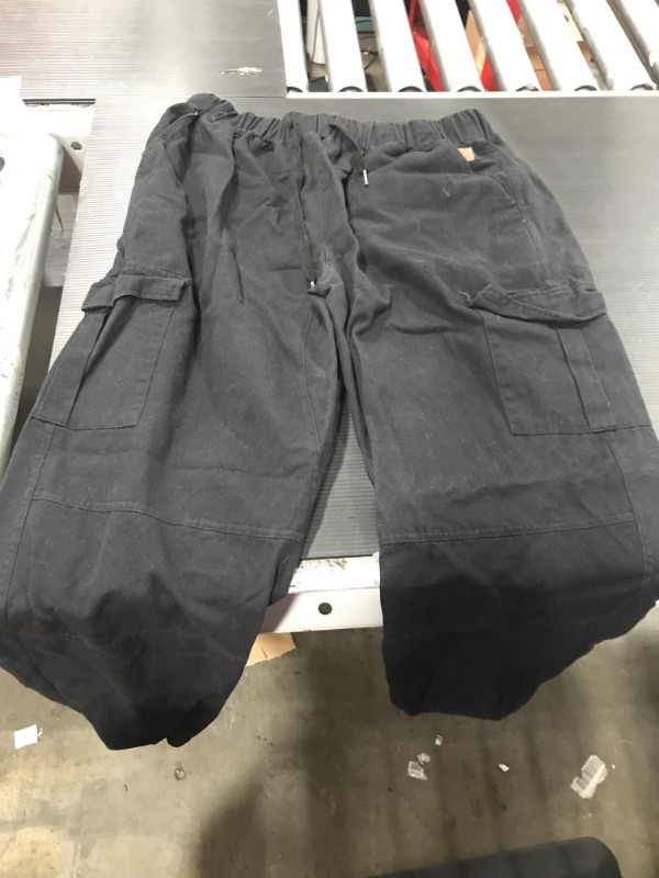 Photo 1 of black cargo pants scrunched bottom