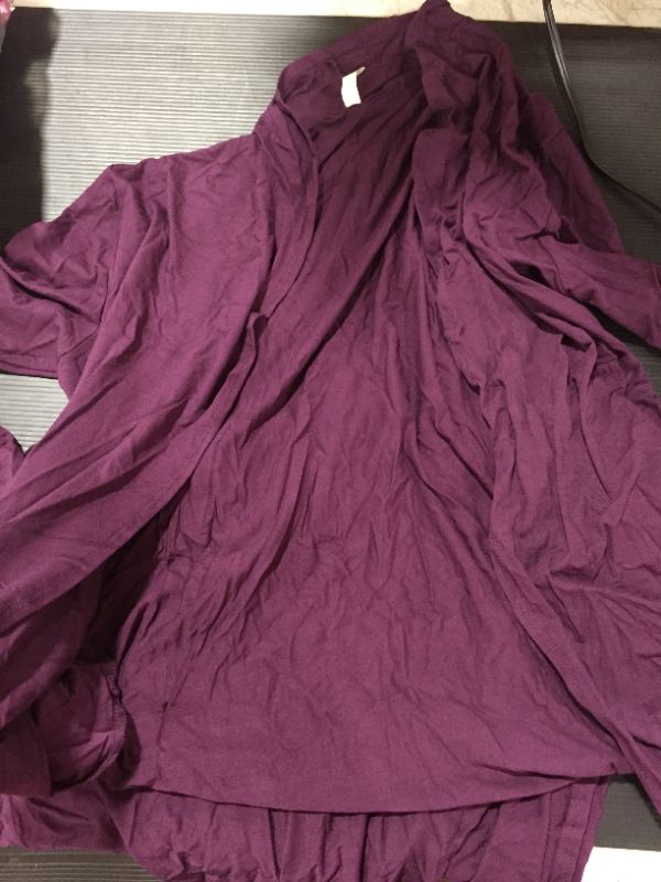 Photo 1 of unkown size, purple cardigan