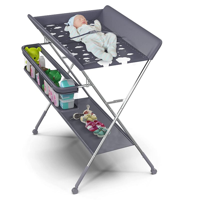 Photo 1 of Babylicious Baby Portable Changing Table - Foldable Changing Table with Wheels - Portable Diaper Changing Station - Adjustable Height Baby Changing Table-Safety Belt and Large Storage Rack for Infants