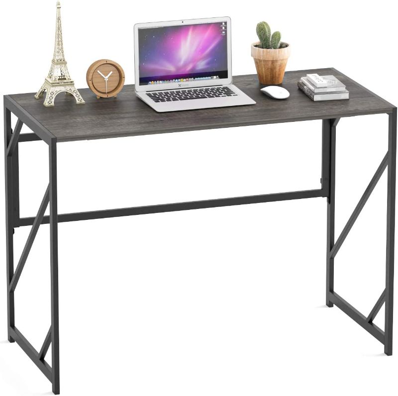 Photo 1 of Elephance Folding Desk Writing Computer Desk for Home Office, No-Assembly Study Office Desk Foldable Table for Small Spaces (Black Oak)
