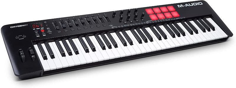 Photo 1 of M-Audio Oxygen 61 (MKV) – 61 Key USB MIDI Keyboard Controller With Beat Pads, Smart Chord & Scale Modes, Arpeggiator and Software Suite Included
