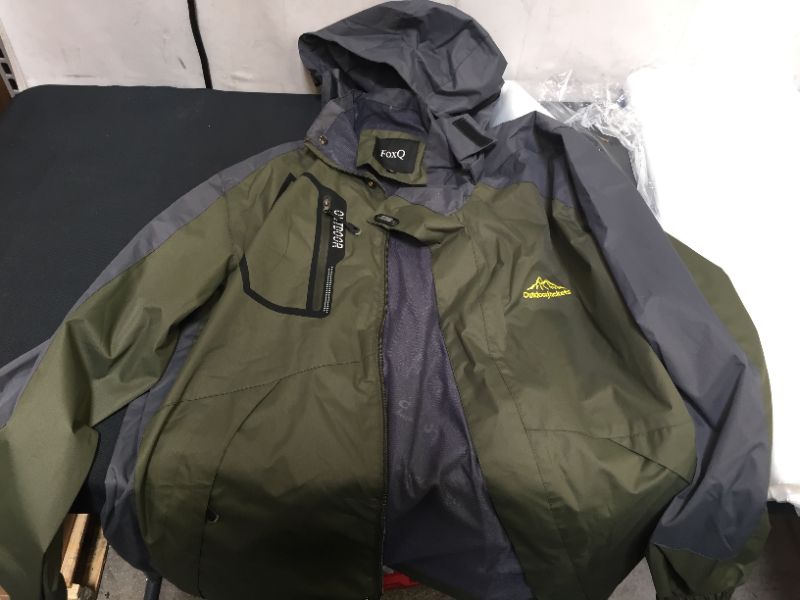 Photo 1 of MEN'S RAIN JACKET SIZE MEDIUM