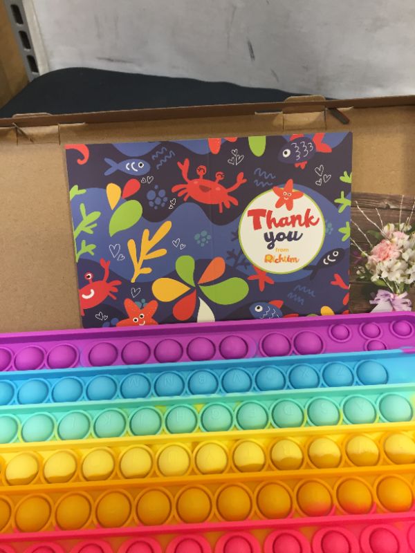 Photo 1 of Richtim Keyboard Pop Push, Rainbow Pop Bubble it, Sensory Squeeze Fidget Toy Silicone Square Popping, Educational Brain Development/ Anti-Anxiety & Stress Relief for Autism Kids
