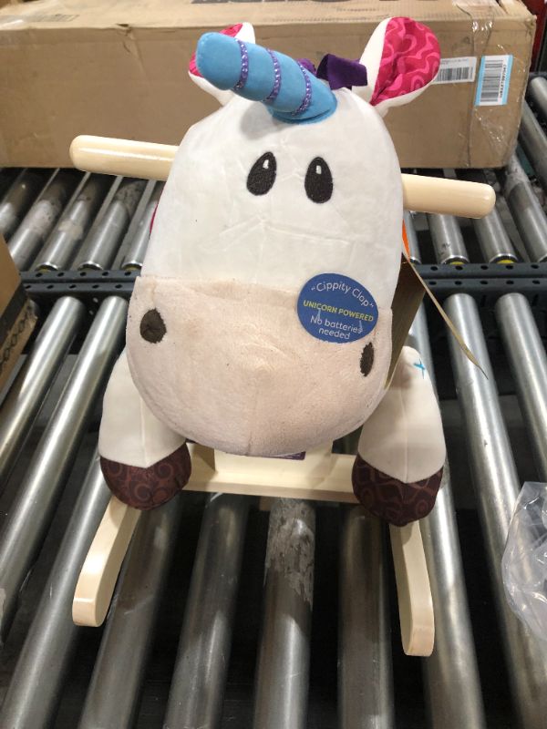 Photo 1 of B. Rocking Unicorn
