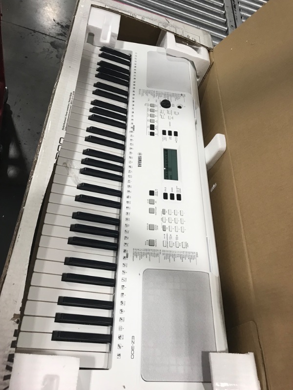 Photo 2 of Yamaha EZ300 61-Key Portable Keyboard with Lighted Keys (Power Adapter sold separately)
