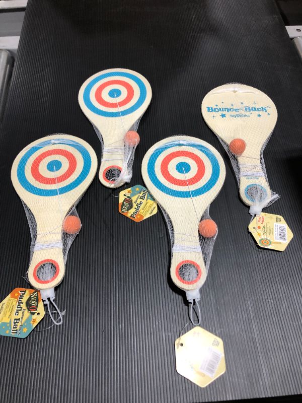 Photo 1 of **PACK OF 4 PADDLES** Bounce Back Paddle Toy Ball
