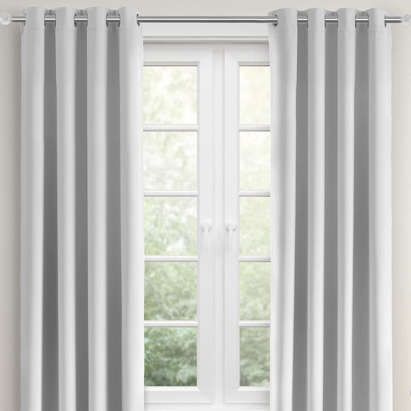 Photo 1 of  Thermal Insulated Blackout Curtains for Bedroom, Room Darkening, Noise Reducing, Grommet Top Window Drapes ( 2 Panels, White, 52" W x 84" L )
