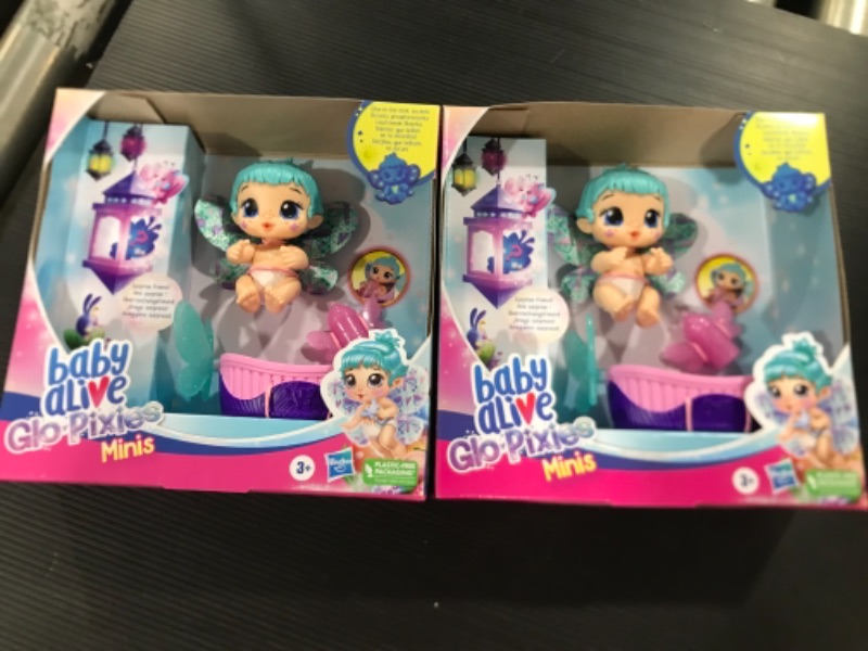 Photo 2 of 2 Pack of Baby Alive GloPixies Minis Doll, Aqua Flutter, Glow-In-The-Dark Pixie Doll