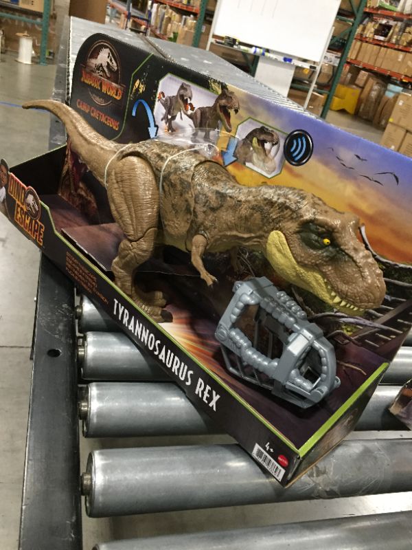 Photo 2 of Jurassic World Stomp ‘N Escape Tyrannosaurus Rex Figure Camp Cretaceous Dinosaur Escape Toy with Stomping Movements, Movable Joints