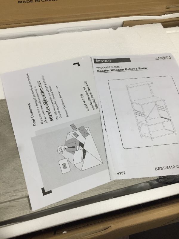 Photo 4 of Bestier Kitchen Bakers Rack Microwave Stand Kitchen Cart on Wheels Utility Storage Shelf with 10 Side Hooks Kitchen Organizer Shelves with Adjustable Feet
