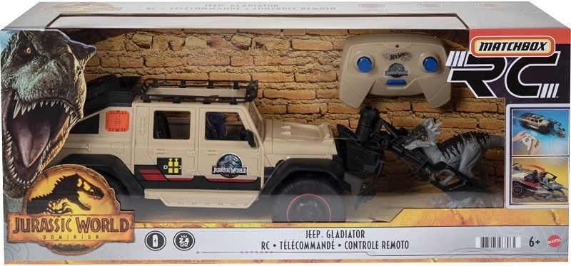 Photo 1 of ?Matchbox Jurassic World Dominion Jeep Gladiator R/C Vehicle with 6-inch Dracorex Dinosaur Figure, Remote-Control Car with Removable Auto-Capture Claw
