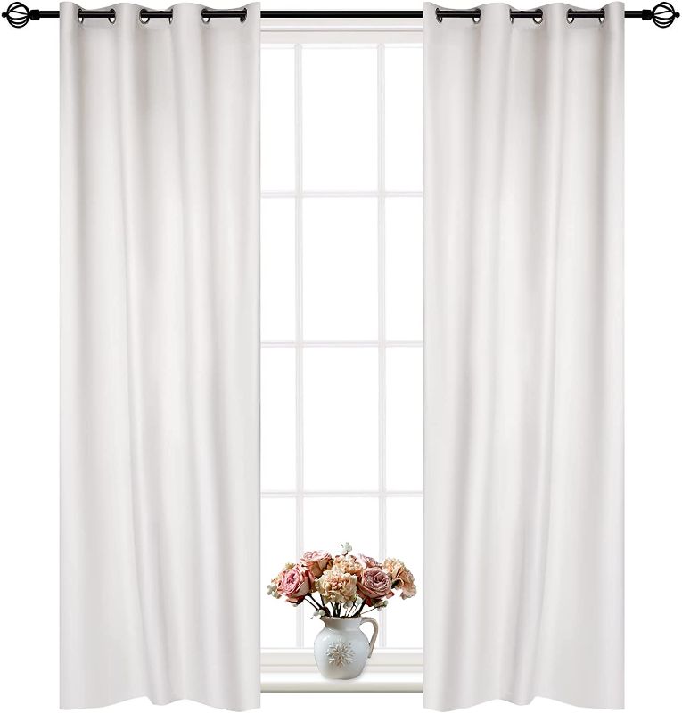 Photo 1 of 1 Panel of White Blackout Curtains with Grommets. Insulated Thermal Window Panel is 54" X 84" in Size and Includes Matching Tie-Back