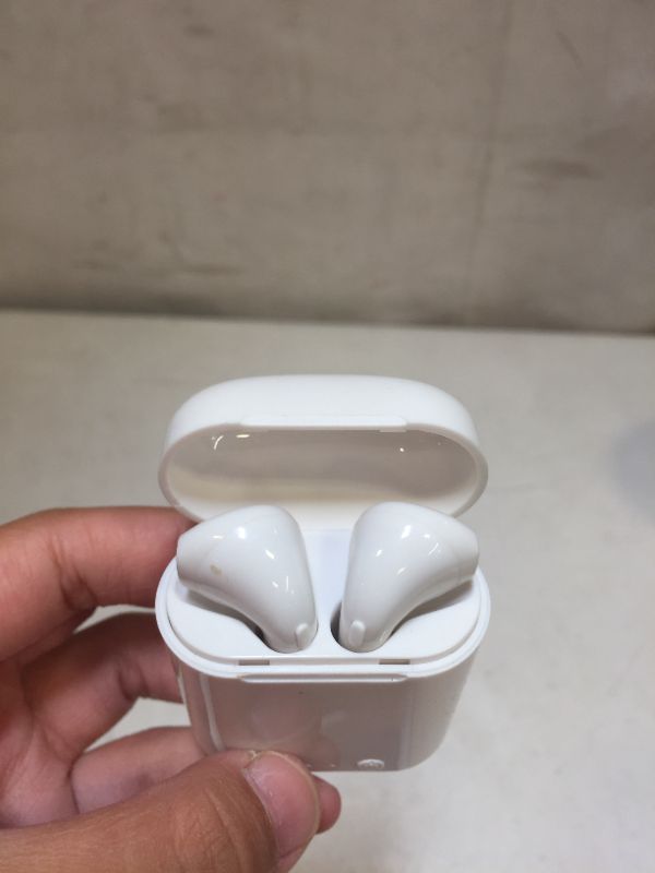 Photo 1 of GENERIC BLUETOOTH EARBUDS - SOLD AS IS