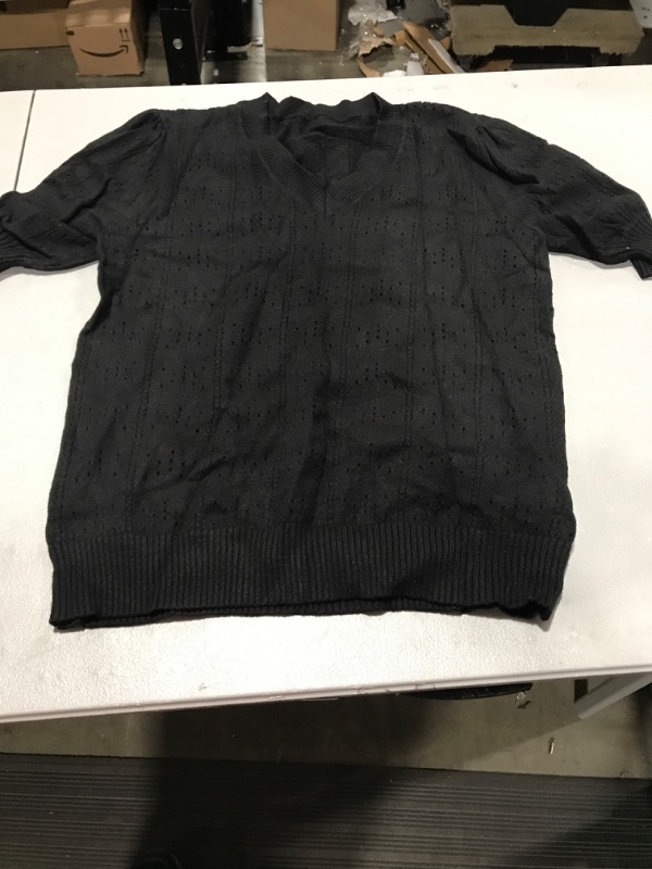 Photo 1 of Black sweater, size XL.