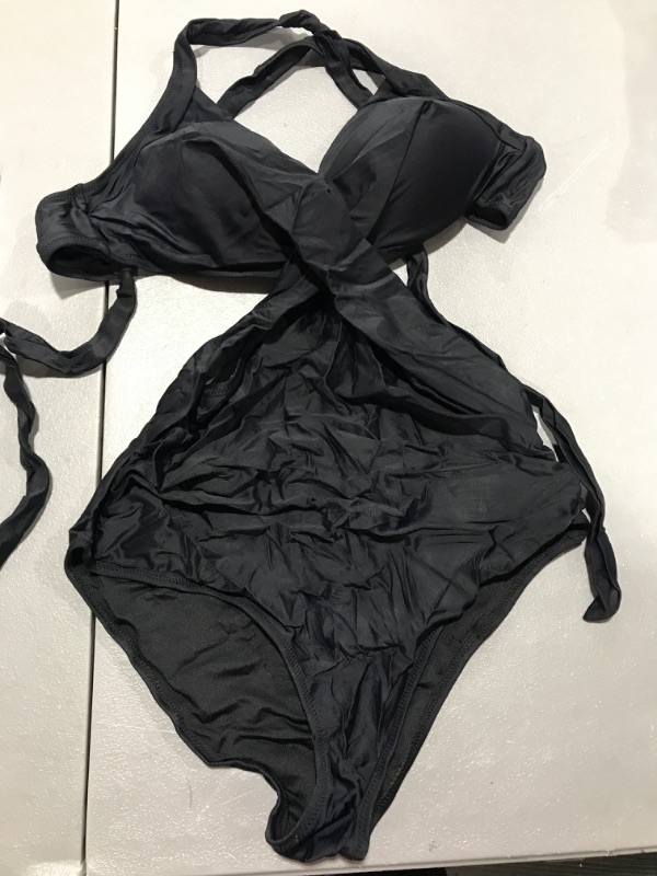 Photo 1 of Black Crisscross bathing suit, size M.