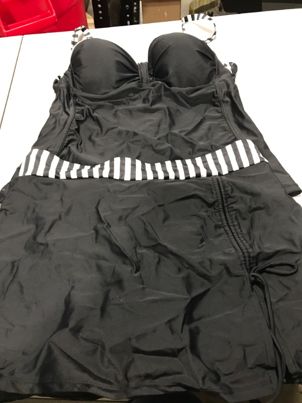 Photo 1 of Black 2 piece bathing suit, size L.