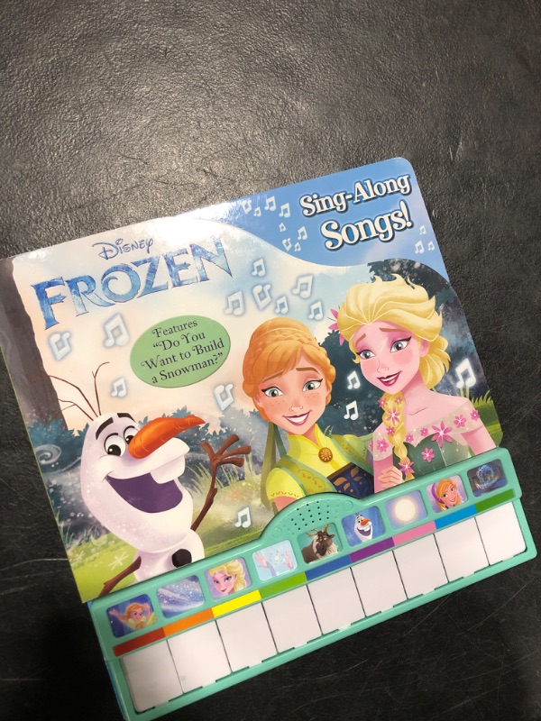 Photo 2 of Disney Frozen Elsa, Anna, Olaf, and More! - Sing-Along Songs! Piano Songbook with Built-In Keyboard - Features "Do You want to Build a Snowman?" - PI Kids 