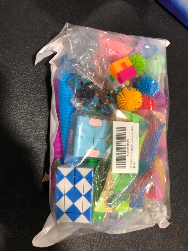 Photo 1 of bag full of kids fidget toys 