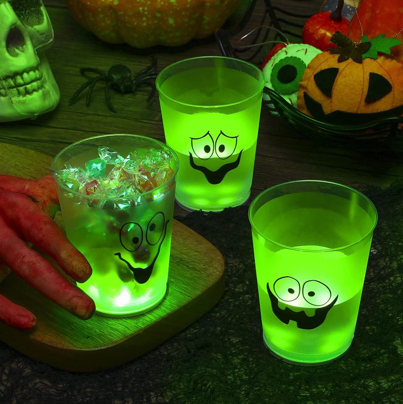 Photo 1 of 12 Pcs Glowing Halloween Ghost Plastic Cups Glow in the Dark Party Supplies Flashing Party Cups Light up Cups with LED Coaster Stickers for Halloween Night Neon Birthday Event Decorations Favor, 9 oz 