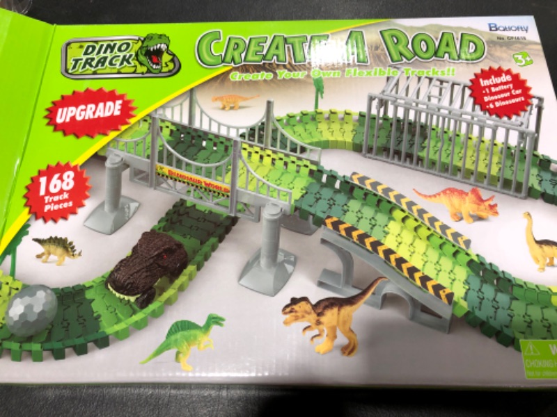 Photo 2 of Batlofty Dinosaur Toys Race Track, Flexible Track Playset, Create A Dinosaur World Road Race with 1 Dinosaur Car and 6 Dinosaur Toys for 3 4 5 6 7 Year Old Boys Girls Birthday Gifts