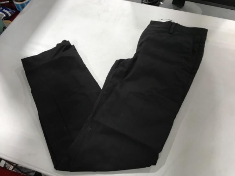 Photo 1 of AMAZON ESSENTIALS BLACK WORK PANTS SIZE 28X32 