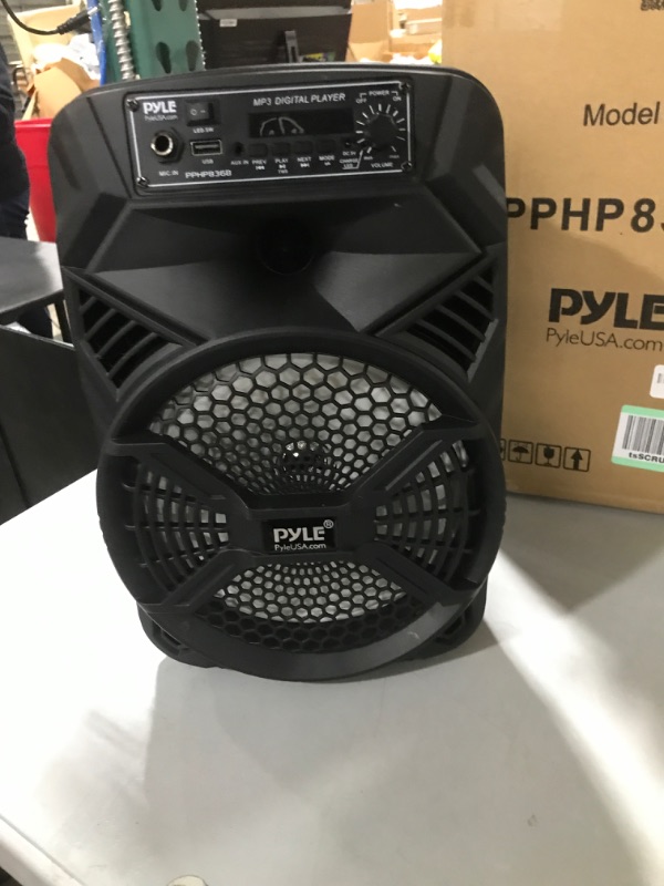 Photo 1 of Portable Bluetooth PA Speaker System - 300W Rechargeable Indoor/Outdoor Bluetooth Portable PA System w/ 8” Subwoofer 1” Tweeter, Microphone In, Party Lights, MP3/USB, Radio, Remote - Pyle PPHP836B