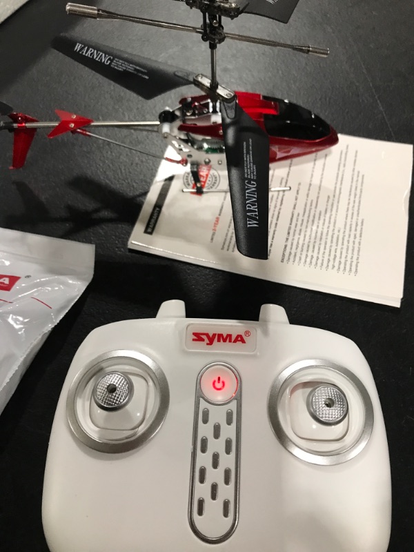 Photo 4 of SYMA RC Helicopters, Remote Control Helicopter Aircraft with Altitude Hold, One Key Take Off/Landing, High & Low Speed and Dual Protection System for Indoor to Fly for Kids and Adults Beginners