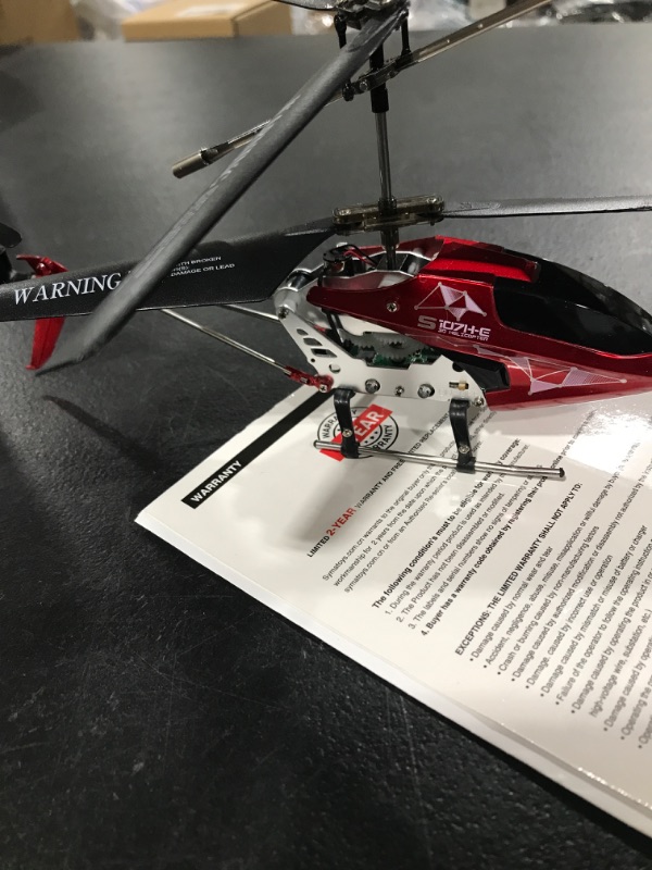 Photo 3 of SYMA RC Helicopters, Remote Control Helicopter Aircraft with Altitude Hold, One Key Take Off/Landing, High & Low Speed and Dual Protection System for Indoor to Fly for Kids and Adults Beginners