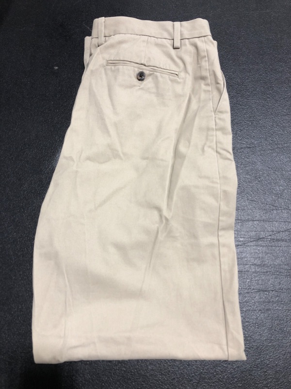 Photo 1 of AMAZON ESSENTIALS MEN'S KHAKI PANT. TAN. SIZE 36 x 34 INCH. PRIOR USE. 