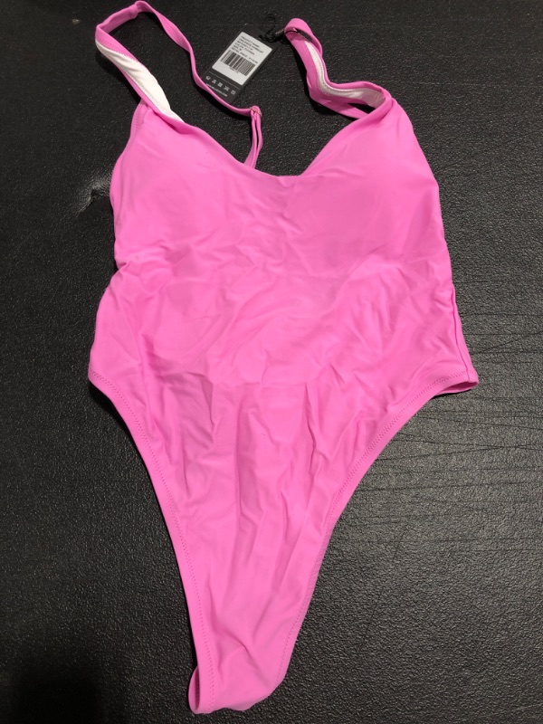 Photo 1 of  WOMEN'S ONE PIECE SWIMSUIT. PINK. SIZE MEDIUM.    