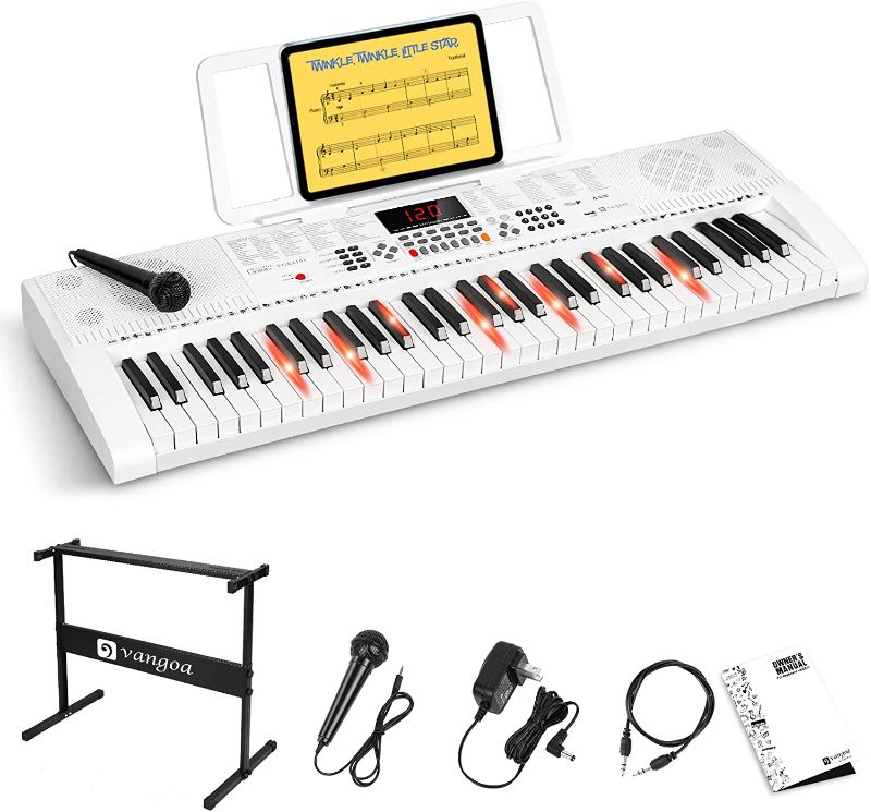 Photo 1 of Vangoa Keyboard Piano with 61 Lighted Keys, Full-Size Electric Piano Keyboard for Beginner Kids Teens Adults with Stand, Microphone, 3 Teaching Modes, USB Port, White
