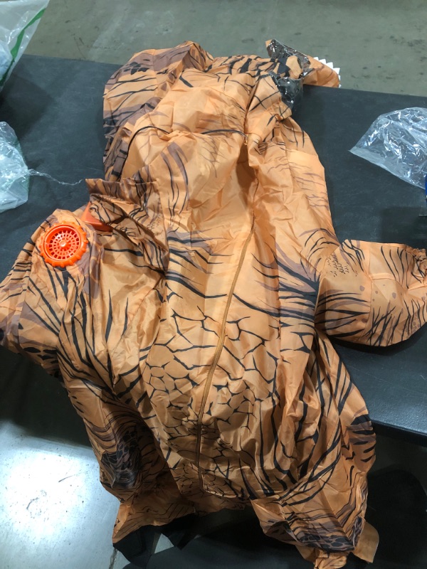Photo 1 of Adult Original Inflatable Dinosaur Costume, T-Rex, Standard
