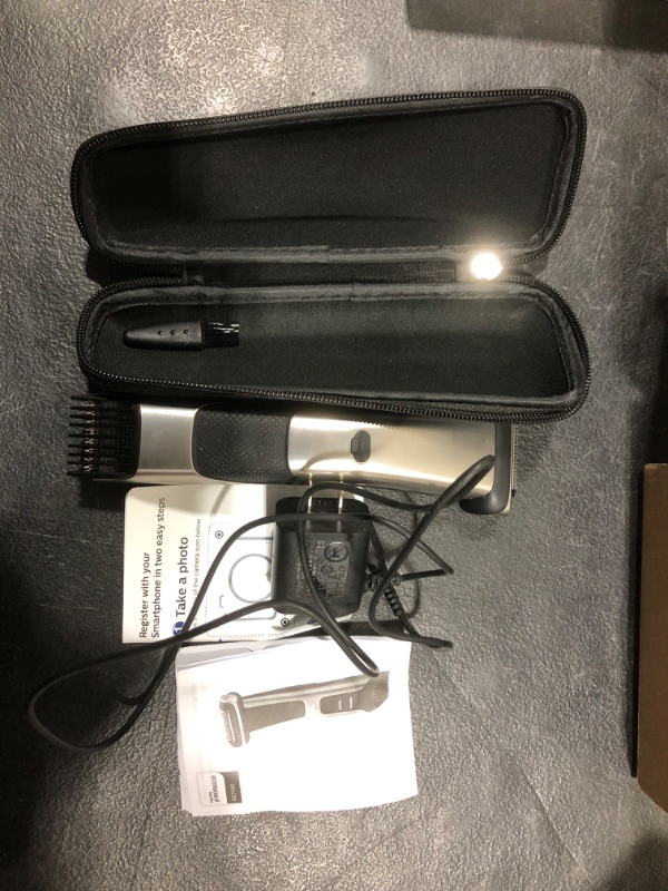 Photo 2 of Philips Norelco Bodygroom Series 7000 Showerproof Body Trimmer & Shaver with Case and Replacement Head, BG7040/42