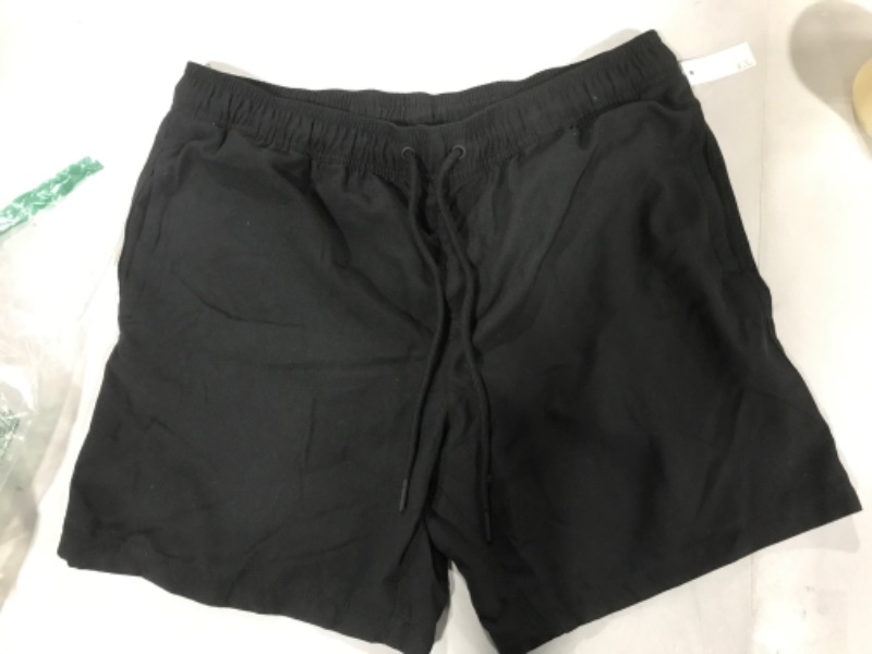 Photo 2 of Amazon Essentials Men's 7" Quick-Dry Swim Trunk Large Black