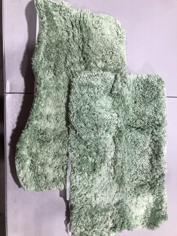 Photo 1 of 2 green bath mats