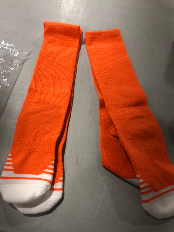 Photo 1 of 2 PAIRS OF ORANGE SOCKS