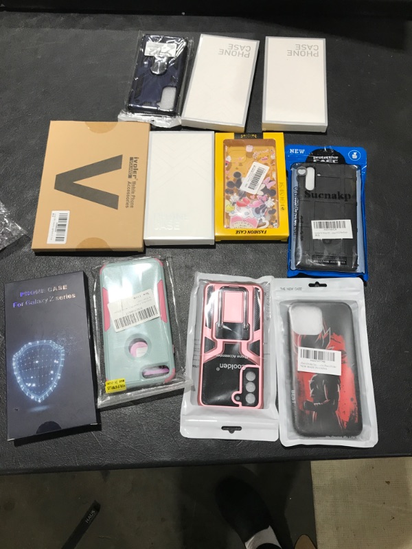 Photo 1 of MISC PHONE CASES BAG LOT 
SOL AS IS 