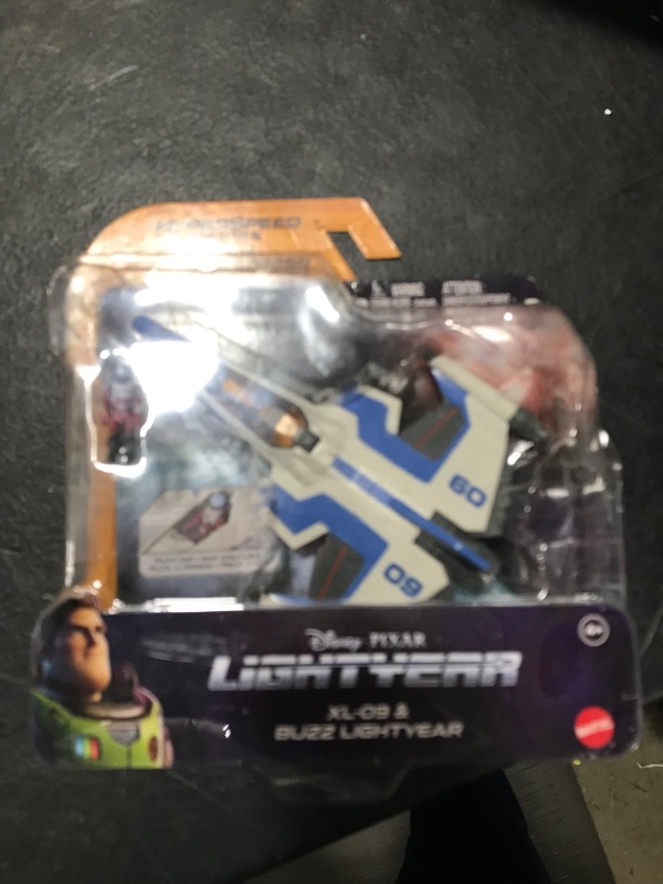 Photo 2 of Disney Pixar Lightyear Hyperspeed Series XL-09 Spaceship & Buzz Lightyear Figure, 6 Inch Long Vehicle & 1.25 Inch Figure, Toy 4 Years & Up XL-09 & Buzz