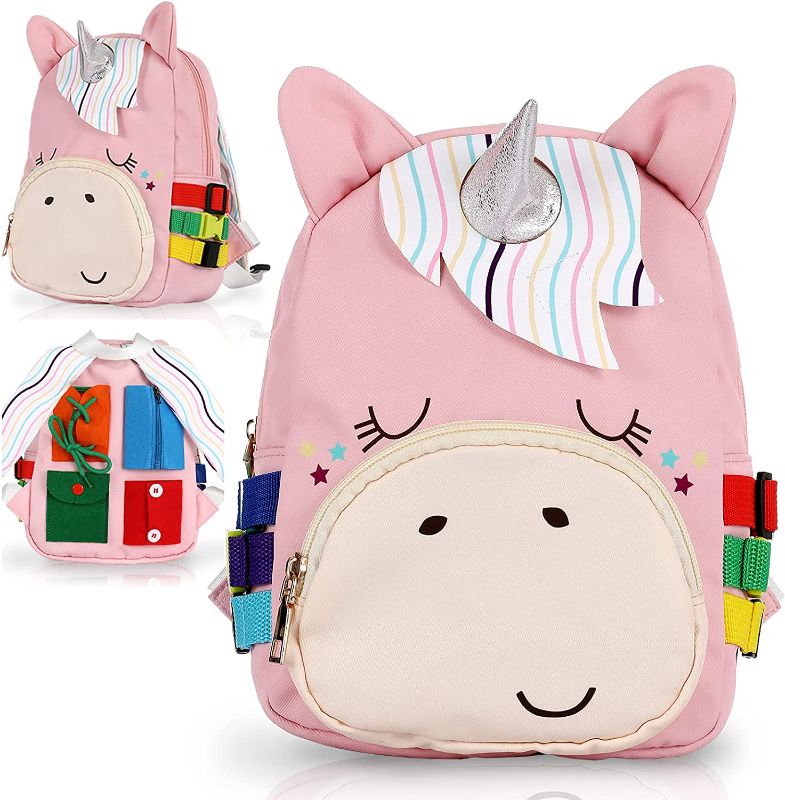 Photo 1 of Busy Board - Toddler Backpack Montessori Education Toys for Kids Fine Motor Skills and Learn Basic Skill, Unicorn Sensory Activities Bag & Travel Toy with Zippers, Buttons, Buckles
