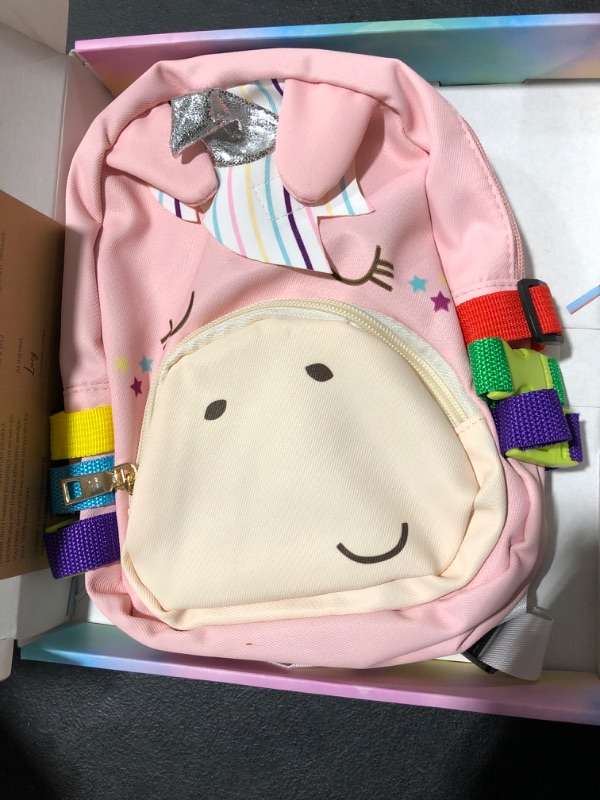 Photo 2 of Busy Board - Toddler Backpack Montessori Education Toys for Kids Fine Motor Skills and Learn Basic Skill, Unicorn Sensory Activities Bag & Travel Toy with Zippers, Buttons, Buckles
