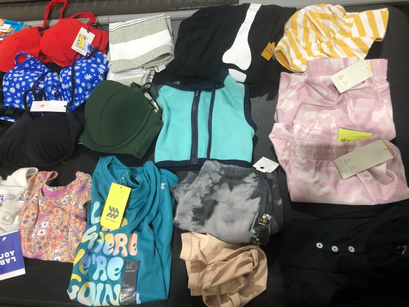 Photo 3 of BAG LOT!! CLOTHING & ACCESSORIES -- VARIETY OF NEW MISC ITEMS -- MISSING PCS. -- LOTS OF BIKINI TOPS -- SIZES VARY 