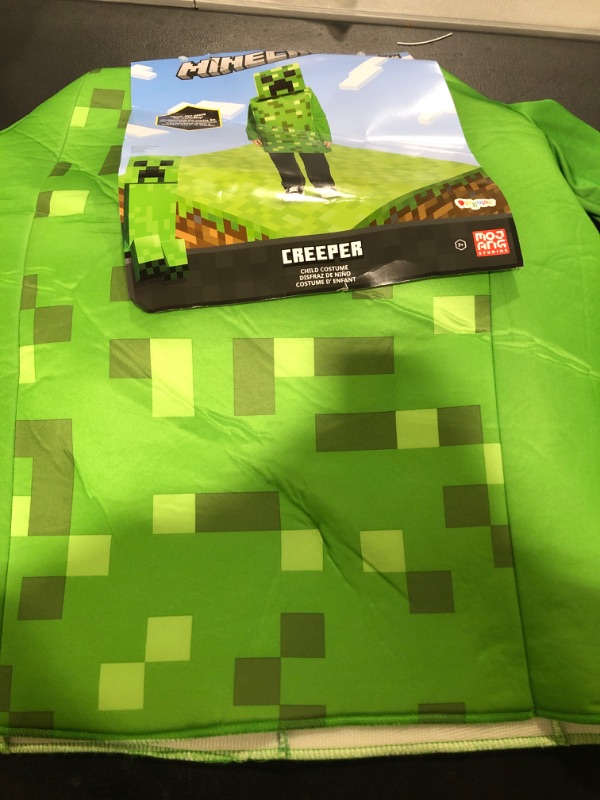 Photo 1 of Boy S Creeper Classic Halloween Costume - Minecraft
SIZE M 7/8 
DONT COME WITH MASK ONLY SUIT