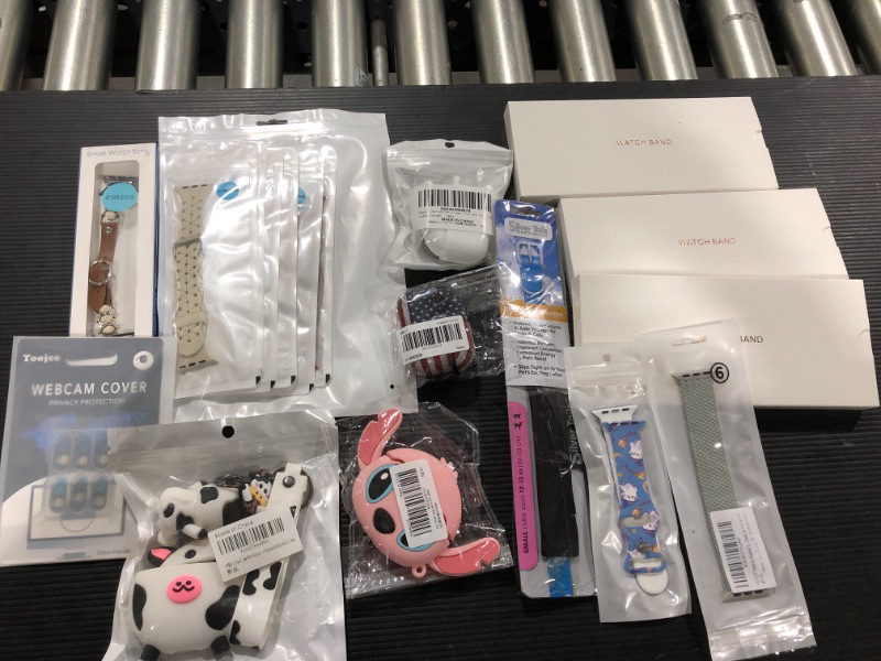 Photo 1 of Small lot of smart watch bands and airpod cases. Various styles and sizes, sold as is.