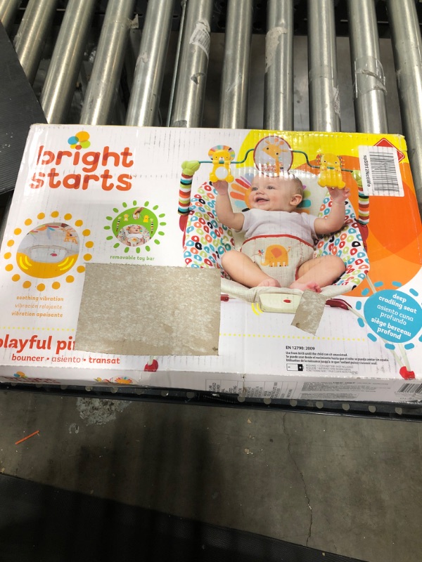 Photo 1 of Bright Starts Playful Pinwheels Portable Baby Bouncer with Vibrating Infant Seat and-Toy Bar, 19.8x13.1x3.4 Inch, Age 0-6 Months