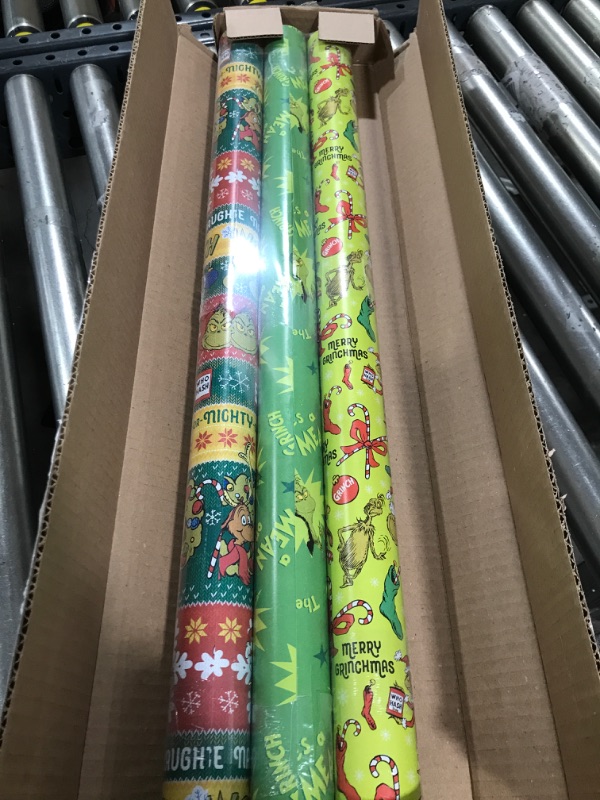 Photo 3 of American Greetings Christmas Wrapping Paper with Cut Lines Bundle, The Grinch (3 Rolls, 105 sq. ft.)