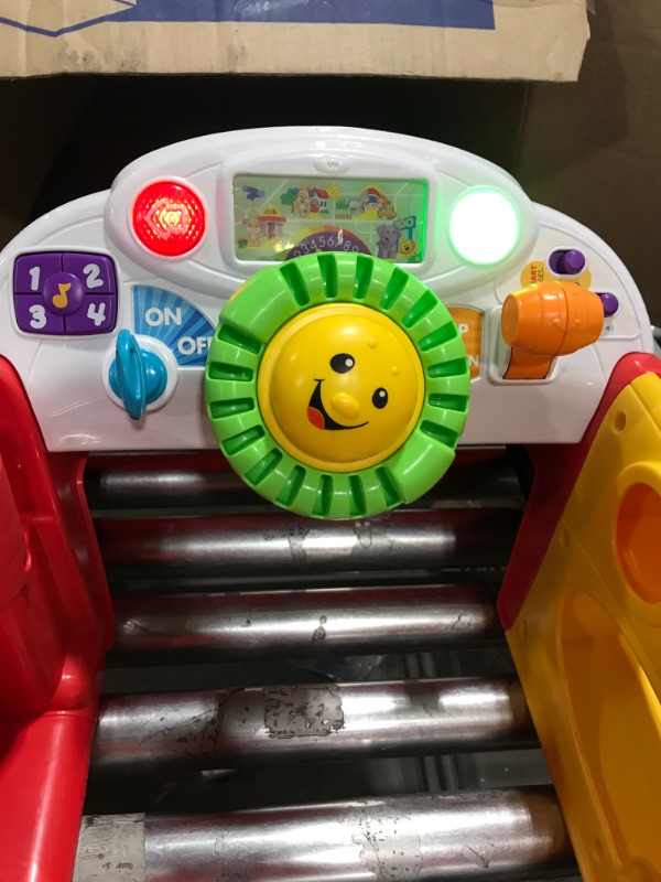 Photo 3 of Fisher-Price Laugh & Learn Crawl Around Car, red interactive play center with Smart Stages learning content for babies and toddlers ages 6 months and up
