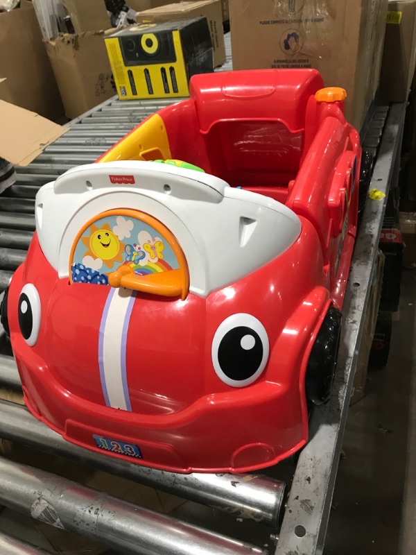 Photo 5 of Fisher-Price Laugh & Learn Crawl Around Car, red interactive play center with Smart Stages learning content for babies and toddlers ages 6 months and up
