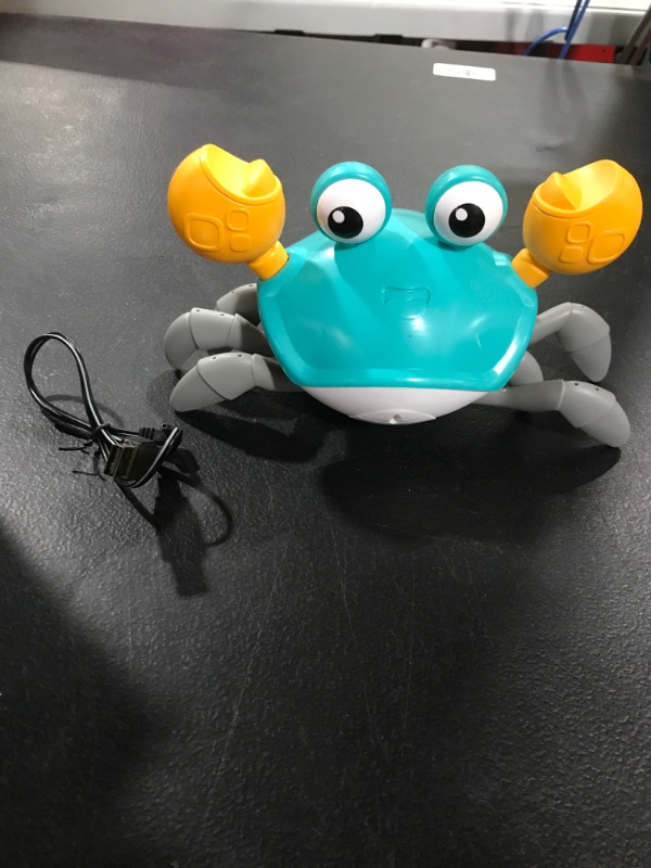 Photo 3 of Crawling Crab Baby Toy with Music and LED Light up,Tummy Time Moving Walking Crab Toys with Sensing Auto Avoidance,Toddler Interactive Learning Development Toy,Rechargeable Battery Crab:green
