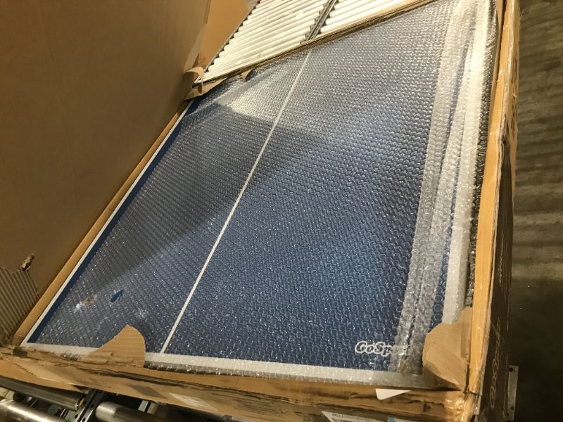 Photo 1 of GoSports Mid-Size Table Tennis Game Set - Indoor/Outdoor Portable Table Tennis Game with Net, 2 Table Tennis Paddles and 4 Balls Blue Table