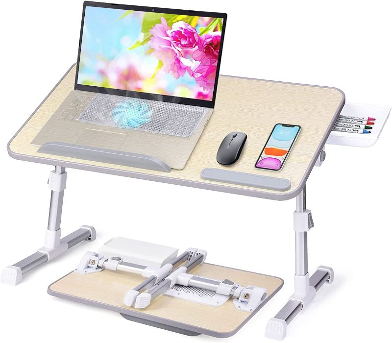 Photo 1 of Slendor Laptop Desk Adjustable Laptop Stand Foldable Bed Table Portable Lap Desk Folding Notebook Stand Reading and Writing Holder Breakfast Tray with Drawer and Cooling Fan for Bed Couch Sofa Floor
Visit the Slendor Store